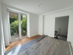 Wohnzimmer - 3 Zi. + 2 Terrassen nach Osten und Westen.